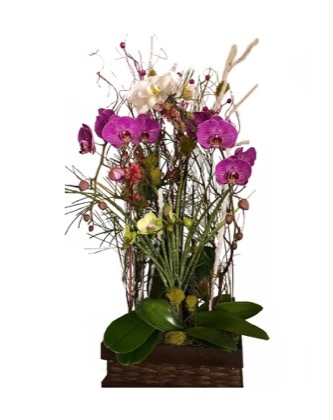 Arrangement no. 10 — Purple and cream orchids with dried branches on a wooden tray base